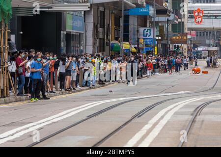 Central, Hong Kong. 27 May, 2020 Hong Kong Protest Anti-National Anthem Law. Crowd gathers and chants for HK independance. Credit: David Ogg / Alamy Live News Stock Photo
