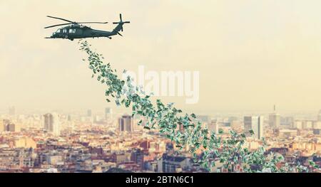 helicopter flies over the city and distributes dollars money to everyone. Helicopter money concept. Financial aid in times of crisis coronavirus covid Stock Photo