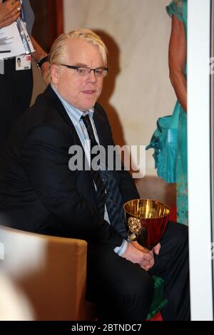 VENICE, ITALY - SEPTEMBER 08: Philip Seymour Hoffman of 'The Master' with the Coppa Volpi Award for 'Best Actor' during the Award Winners Photocall Stock Photo