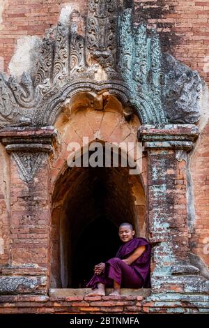 A Novice Monk At Dhammayangyi Temple, Bagan, Mandalay Region, Myanmar. Stock Photo