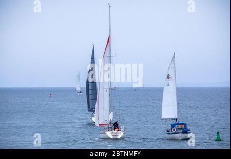 Vitte, Germany. 25th May, 2020. Sailing boats are on the Baltic Sea between the islands of Rügen and Hiddensee. Credit: Jens Büttner/dpa-Zentralbild/ZB/dpa/Alamy Live News Stock Photo