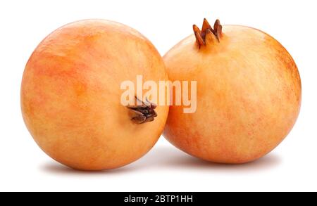yellow seedless pomegranate path isolated on white Stock Photo