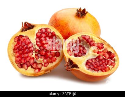 sliced yellow seedless pomegranate path isolated on white Stock Photo