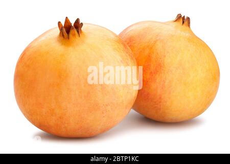 yellow seedless pomegranate path isolated on white Stock Photo