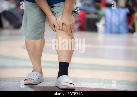 Senior man having knee problems Stock Photo