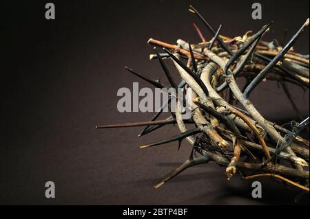 Crown of thorns over a dark background Stock Photo