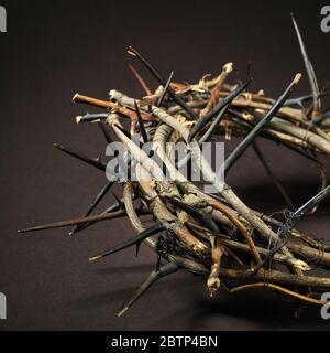 Crown of thorns over a dark background Stock Photo