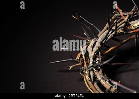 Crown of thorns over a dark background Stock Photo