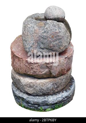 Sacred mystical installation made of old mill stones isolated on white Stock Photo