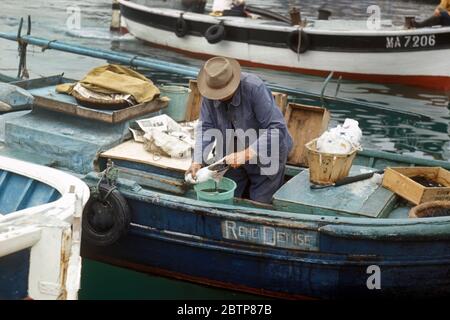 Fisherman in the old harbour of Marseille in France pictured in 1967 Stock Photo