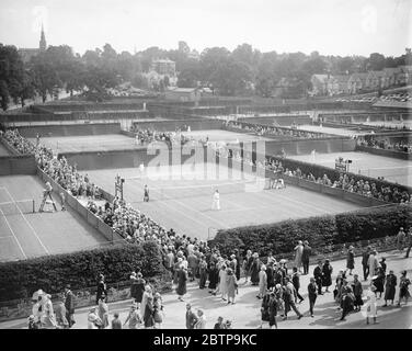 Lawn tennis at Wimbledon . A panoramic view showing play in progress on the courts . 22 June 1927 Stock Photo