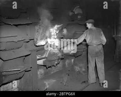 Gravesend Gasworks in Kent . Loading gas coal into retorts . 1939 Stock ...