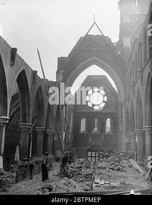 Arches with Nothing to Support Photo shows : Roofless St . Jude ' s Church , Gray ' s Inn Road , W . C . , which is fast disappering under th onslaught of the demolition men . 16 May 1936 Stock Photo