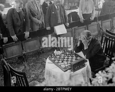 Lost in her game . Chess champions from every part of the world are  competing in the second annual Chess Congress which has opened at the Grand  Hotel , Margate . One