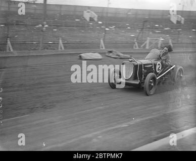 Woman driver takes up midget car racing . Fay Taylor , well known ...