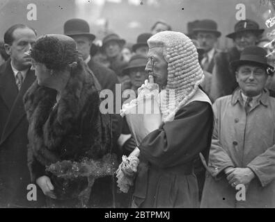 Judges leave Westminster Abbey. Judges assembled at the Law Courts for the opening of the Michaelmas Law Sitting after attending the annual Judges service at Westminster Abbey and the Red Mass at Westminster Cathedral. Photo shows: Judge Sir Mordaunt Snagge [?] of Westminster County Court living after the Abbey service. [whig, monocle] 12 October 1936 Stock Photo