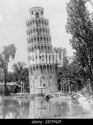 Chicago's 'leaning Tower'. A replica of the world famed leaning Tower of Pisa, which is being erected in a Chicago Park. It is 94 feet in height, 28 feet in diameter at the base and 26 feet at the top-exactly one half of the Italian original. The tower leans 7'4 out of a plumb . Stock Photo