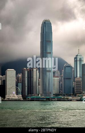 Hong Kong / China - July 23, 2015: Iconic Hong Kong city skyline, view from Tsim Sha Tsui Promenade Stock Photo