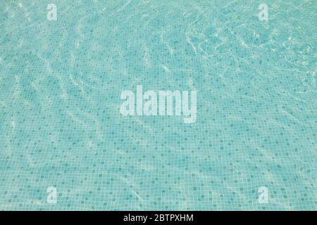 Turquoise blue surface of the water in the swimming pool Stock Photo