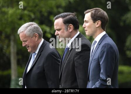 Washington, Untied States. 27th May, 2020. From left to right, Acting Chief of Staff Mark Meadows, Dan Scavino, White House Deputy Chief of Staff for Communications, and Jared Kushner, Presidential advisor and President Trump's son-in-law, depart the White House with President Donald Trump, in Washington, DC on Wednesday, May 27, 2020. President Trump and the First Lady are traveling to NASA's Kennedy Space Center to watch the SpaceX Mission 2 launch. Photo by Kevin Dietsch/UPI Credit: UPI/Alamy Live News Stock Photo