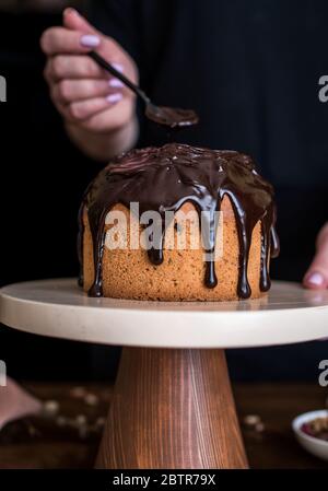 Easter composition with sweet bread, kulich and eggs on light background. Easter holidays breakfast concept. Stock Photo