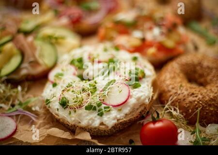 Composition of various homemade bagels sandwiches with sesame and poppy seeds Stock Photo