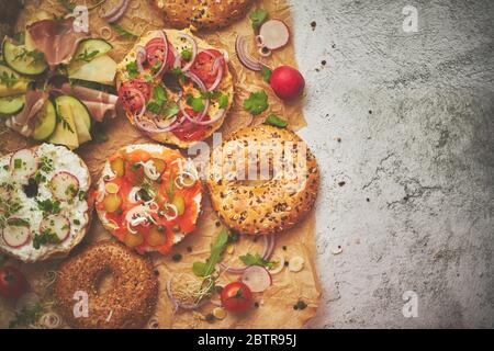 Composition of various homemade bagels sandwiches with sesame and poppy seeds Stock Photo