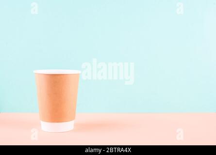 Paper glass with drinking tubes. Eco utensils on a light background. Zero waste.Sustainable lifestyle concept Stock Photo