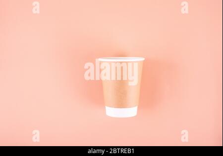 Paper glass with drinking tubes. Eco utensils on a light background. Zero waste.Sustainable lifestyle concept Stock Photo