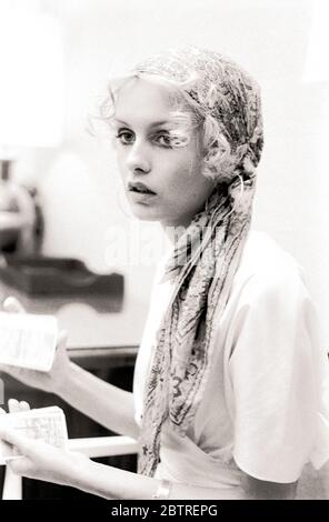 1960's supermodel 'Twiggy' backstage before a fashion show in 1968. Dame Lesley Lawson DBE -  born 19 September 1949 - is an English model, actress, and singer, widely known by the nickname Twiggy. She was a British cultural icon and a prominent teenage model during the swinging sixties in London.  Twiggy was initially known for her thin build (thus her nickname) and the androgynous appearance considered to result from her big eyes, long eyelashes, and short hair.She was named 'The Face of 1966' by the Daily Express and voted British Woman of the Year. By 1967, she had modeled internationally. Stock Photo