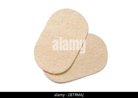 Natural dish washing sponges, kitchen eco coconut scrub scourer, 100% natural loofah plant, biodegradable scrub pad isolated on white. Stock Photo