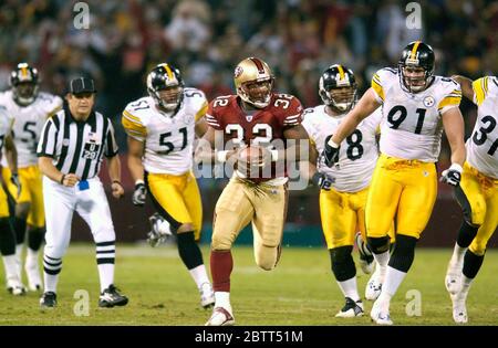 Washington Redskins Derrick Blaylock (48) is slowed by Pittsburgh Steelers  Casey Hampton (98) and Clark Haggans (53) during their preseason football  game played at FedEx Field in Landover, MD, Saturday, August 18