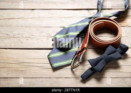 Men's accessories on a wooden background. Place for text. Daddy's Day Holiday Concept Stock Photo