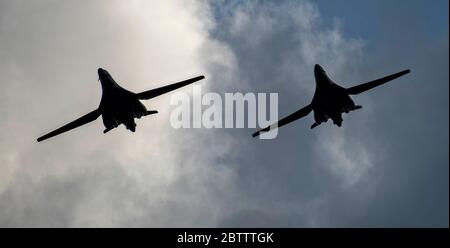 Two U.S. Air Force B-1B Lancer stealth bomber aircraft from the 9th Expeditionary Bomb Squadron, fly in formation during a large force exercise May 22, 2020 at Andersen Air Force Base, Guam. Stock Photo