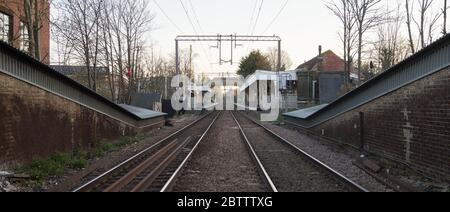 Highams Park London Overground Station looking down the tracks. London Stock Photo