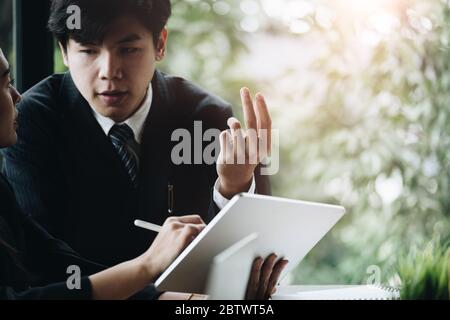 Business team meeting woking with smart tablet computer, Business discussing concept Stock Photo