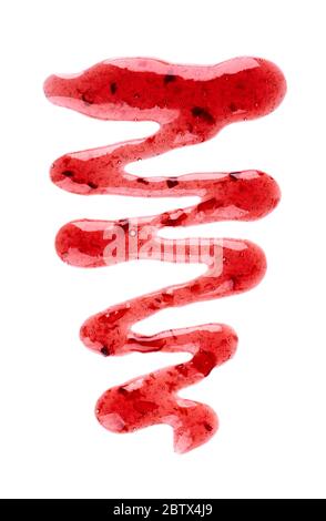 Cherry jam drizzle isolated on white background. Splashes of red berry jam. Top view. Stock Photo