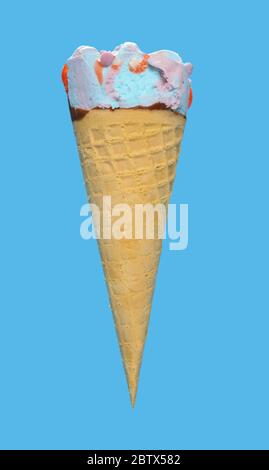 side view marshmallow and raspberry flavor ice cream cone with a small bite on blue background Stock Photo