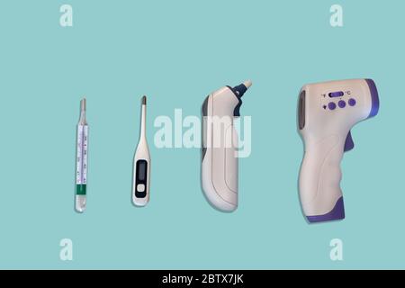 Different types of thermometer, analog and digital, earphone and laser, isolated on light blue background. Evolution of thermometers over time. Stock Photo