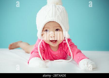 Newborn child in pink  polka dot clothing Stock Photo