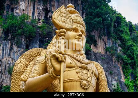 Statue of Lord Muragan and entrance at Batu Caves in Kuala Lumpur, Malaysia. Stock Photo