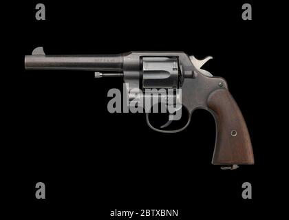 M1917 Revolver issued by US Army during WWI to Charles H Houston. Colt Model 1917 Revolver .45 ACP (Automatic Colt Pistol) No 22-883 issued by the United States Army to Charles Hamilton Houston during World War I. The gun is comprised of metal with wood applied to the handle. Stock Photo