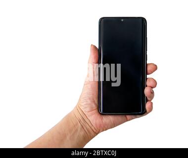 Senior woman hand holding phone isolated, white background Stock Photo