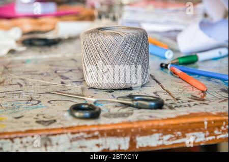 Grey color ball of threads wool in a sewing laboratory Stock Photo