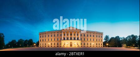 Oslo, Norway. Royal Palace - Det Kongelige Slott In Summer Evening. Night View Of Famous And Popular Place. Panorama, Panoramic View. Stock Photo