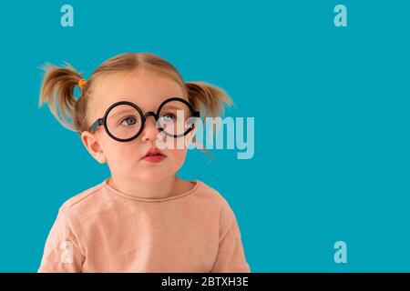 Portrait of a kid with round glasses Stock Photo