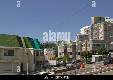 Busan, South Korea, September 14, 2019: cityscape view with cars going down slope Stock Photo