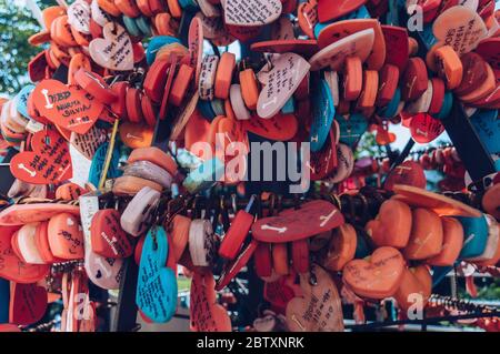 Busan, South Korea, September 14, 2019: close up view of Busan tower love and wishes heart shaped locks Stock Photo