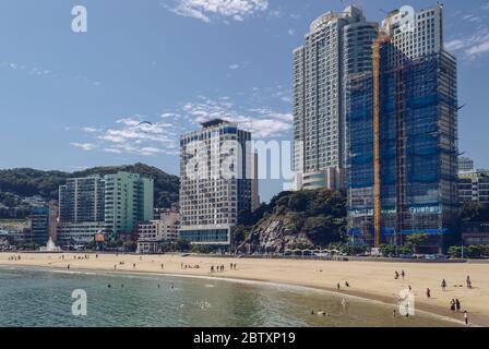 Busan, South Korea, September 14, 2019: people relaxing at Songdo beach on sunny day Stock Photo