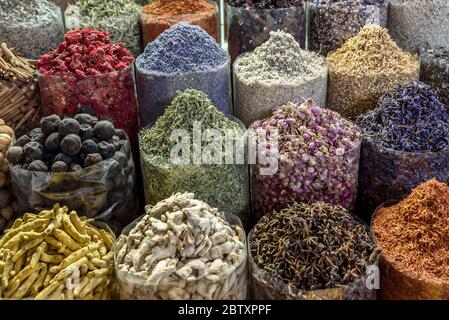 Colourful spices set out in a traditional Arabian Souk. The soul is located in Dubai, in the Middle East. Stock Photo